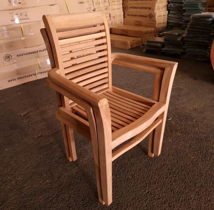 Two Teak Stacking Chairs with Cushions